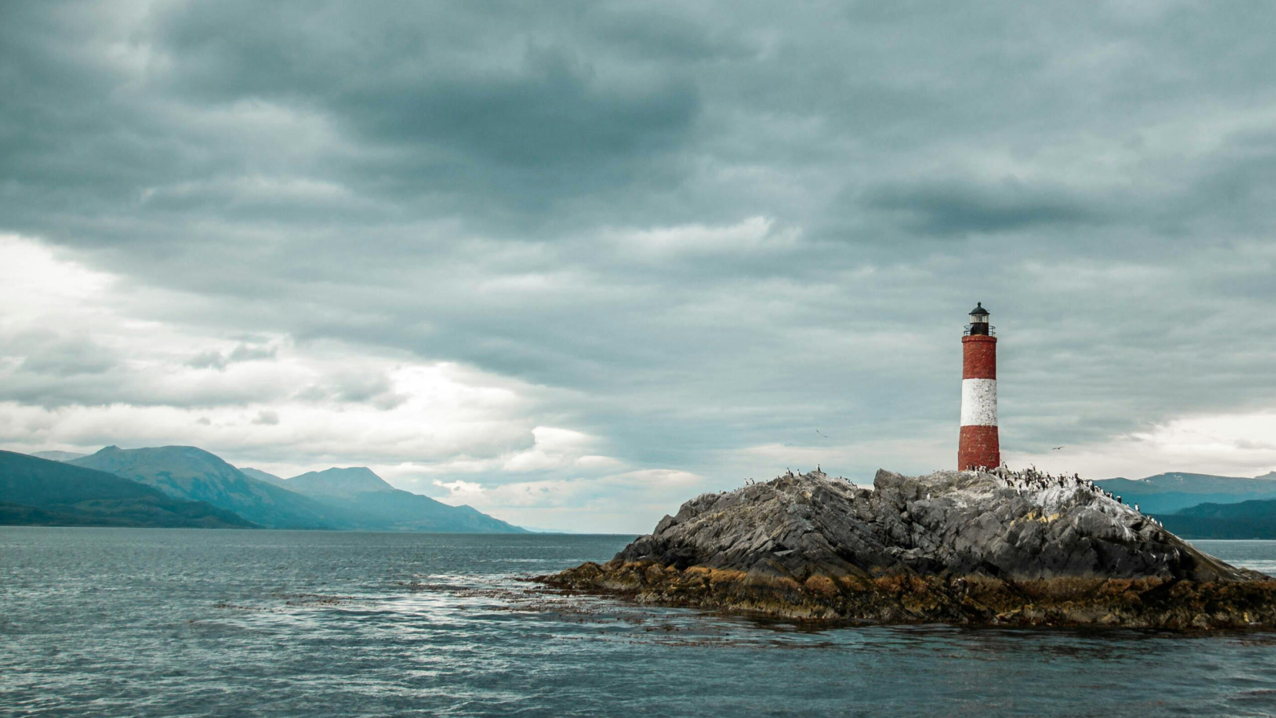 lighthouse on rocky seas